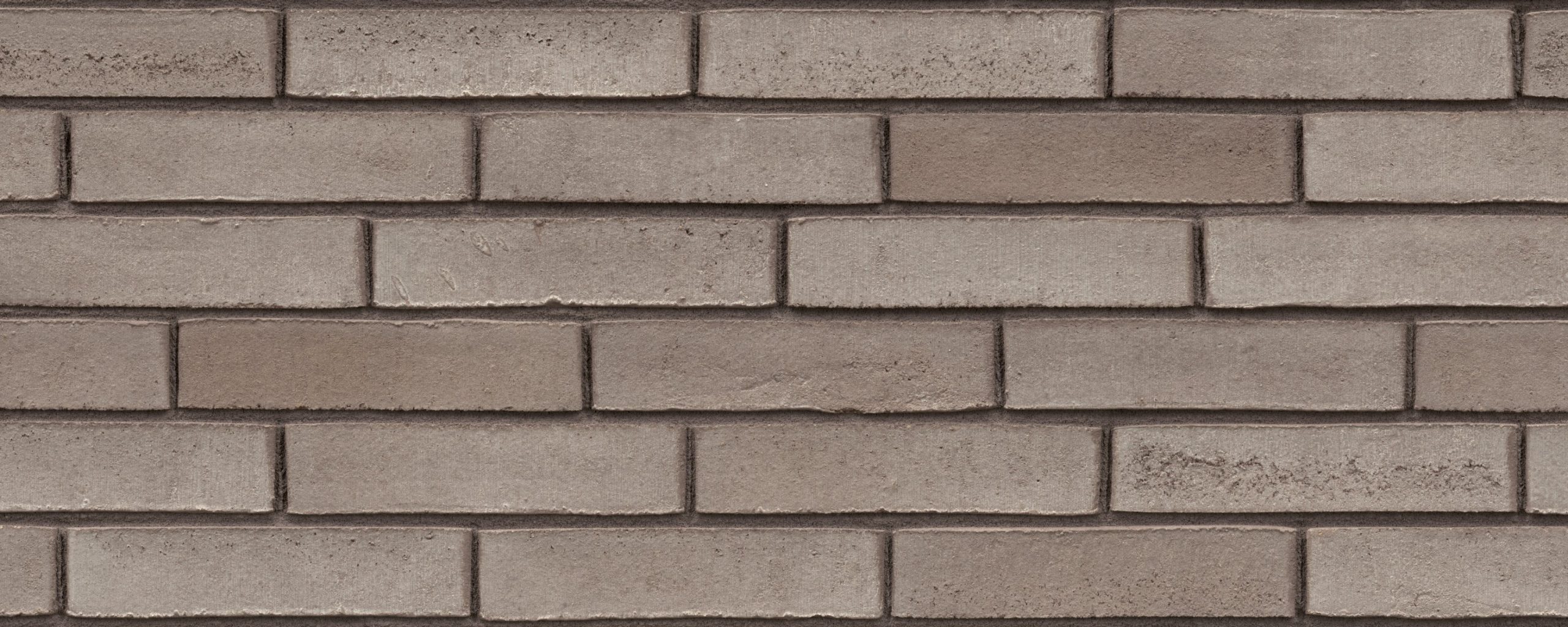 Gevel in metselwerk met Terca Lagune Akemi gevelstenen van Wienerberger, grijze Wasserstrich-stenen